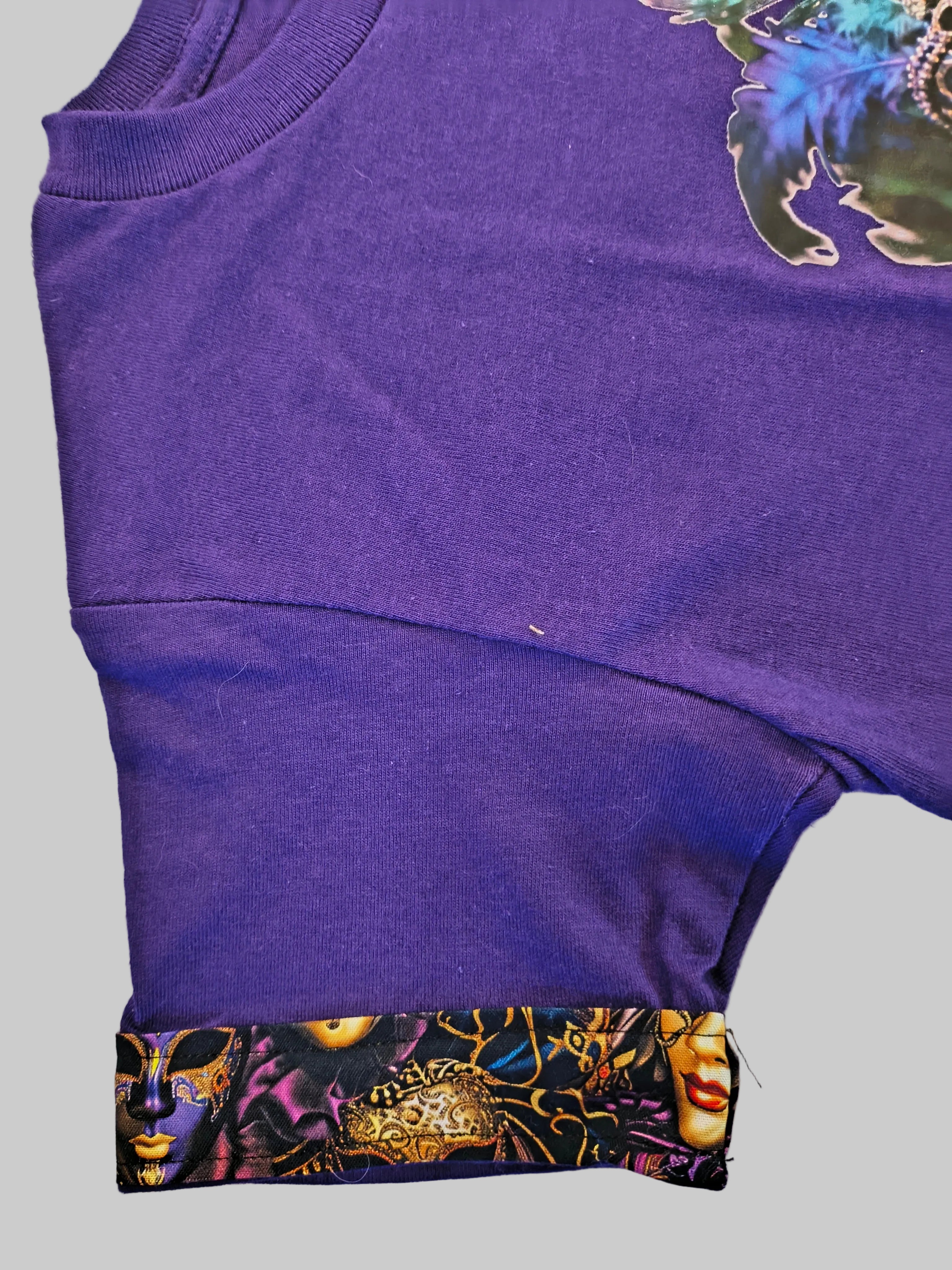 Short Sleeve T-Shirt, purple, 100% cotton, beautiful Peacock mask graphic with artist designed cotton trim on arms and bottom hem.