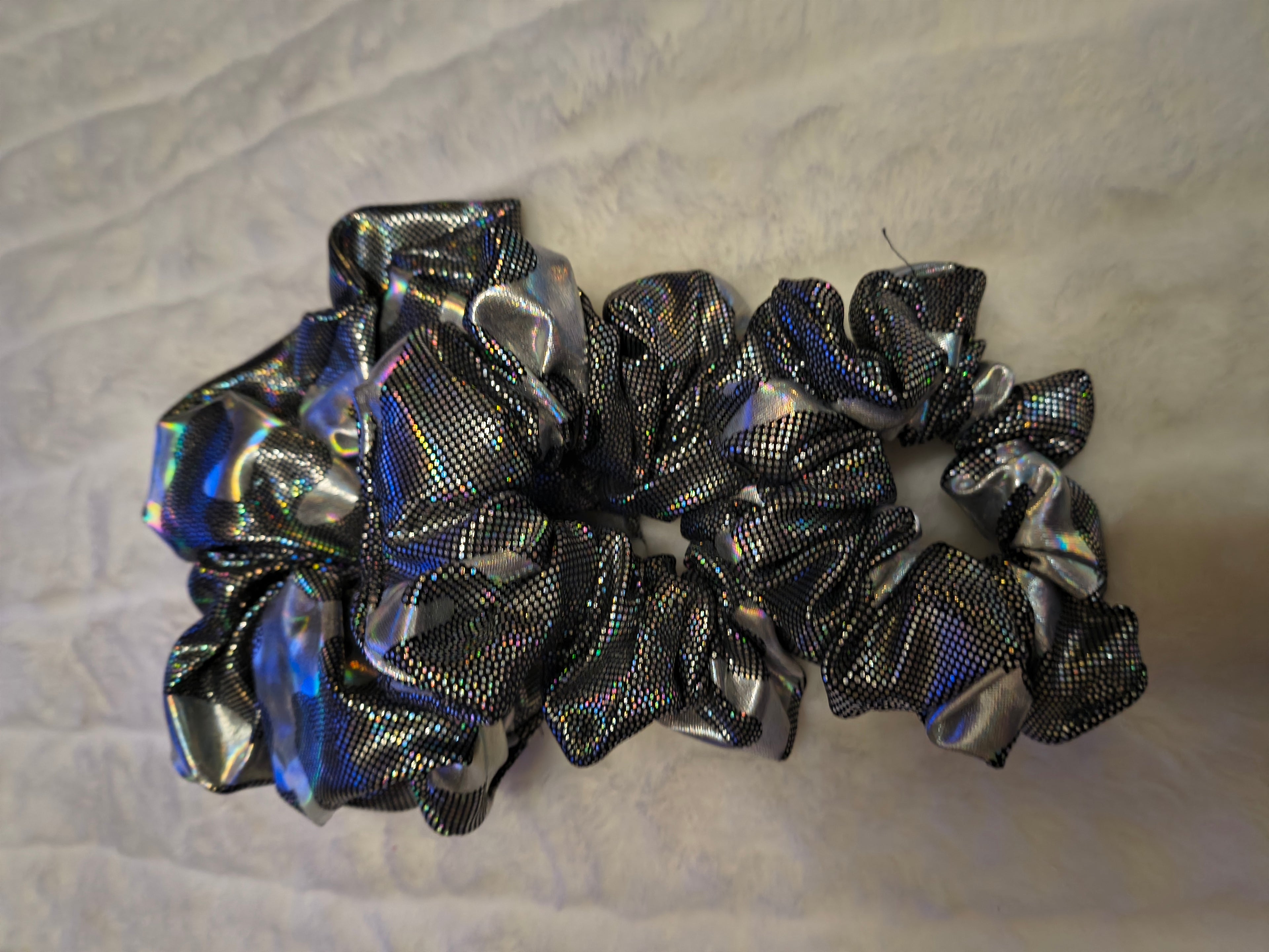 Scrunchie, hair accessory, set of three (sm, md, and lg), Black and silver camouflage material, the silver shines in the light