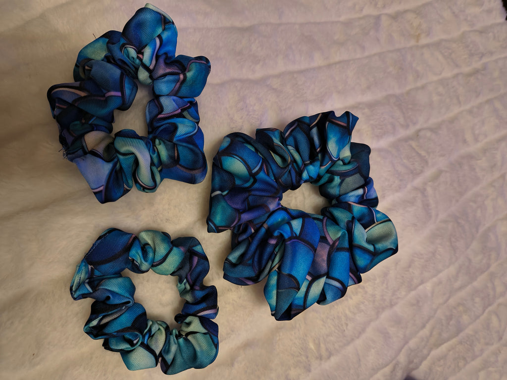 Scrunchie, hair accessory, 3 pack including a small, medium and Large scrunchie in deep blues and a variegated colors