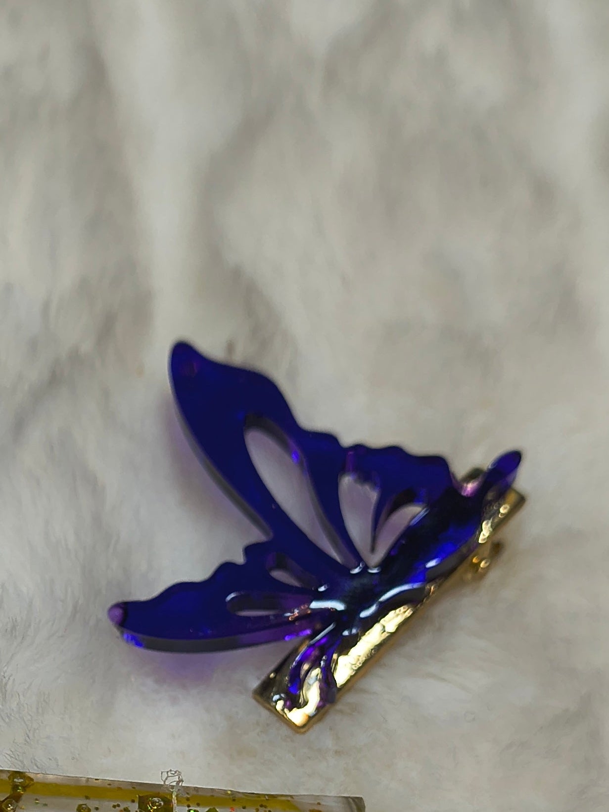 Hair Clips, Four in the set, three butterfly clips in multi color sparkled resin and one long clip yellow/gold sparkles
