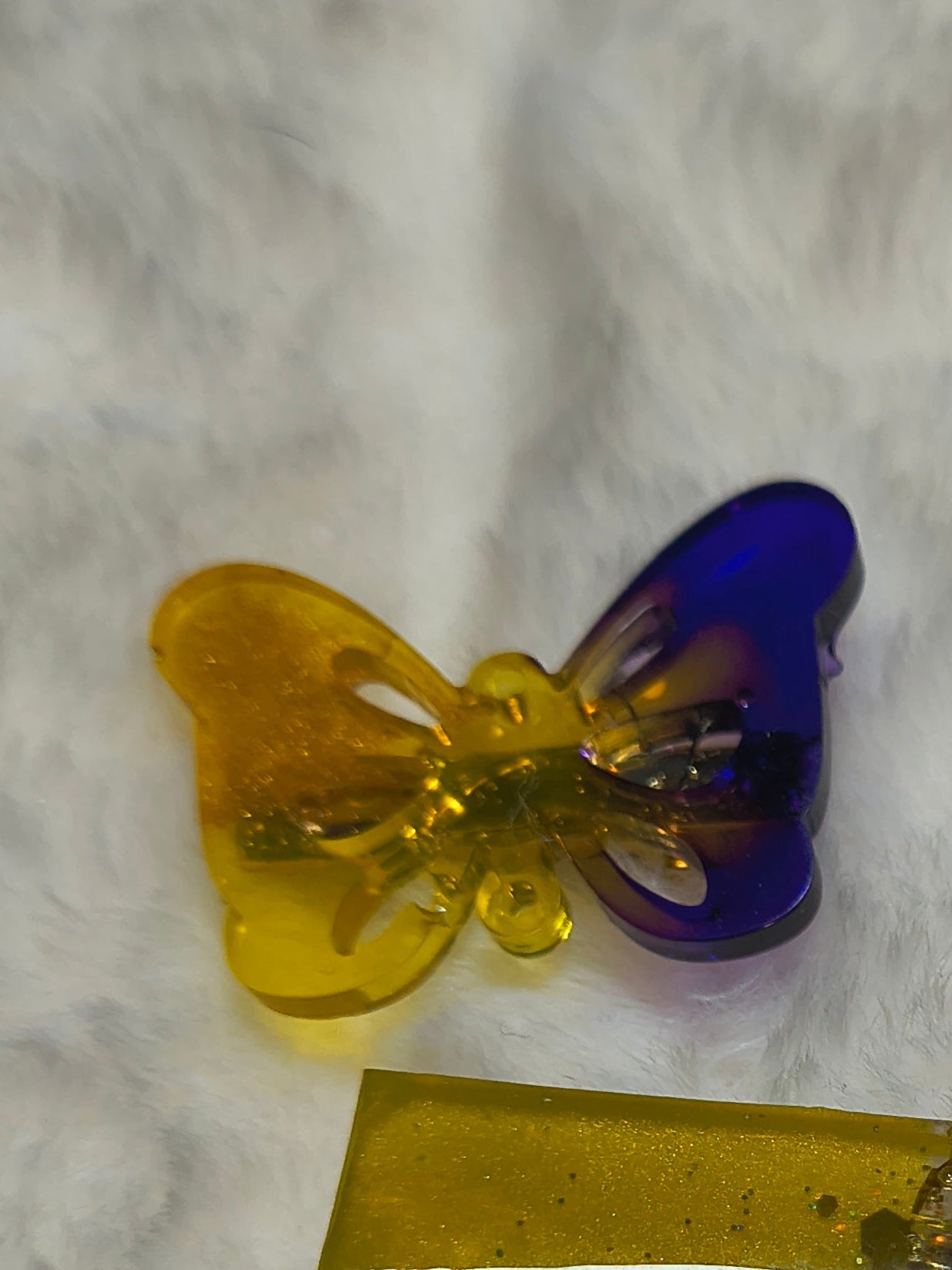 Hair Clips, Four in the set, three butterfly clips in multi color sparkled resin and one long clip yellow/gold sparkles