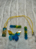 Hair Clips, Set of three clips and a necklace, all in complimentary colors, two of the clips are same style, and a butterfly