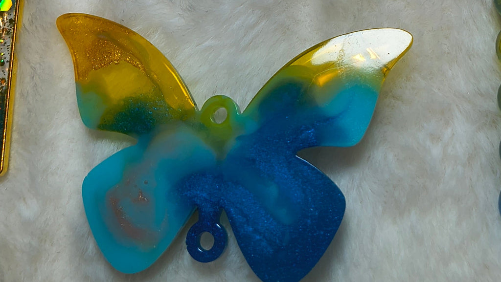 Hair Clips, Set of three clips and a necklace, all in complimentary colors, two of the clips are same style, and a butterfly