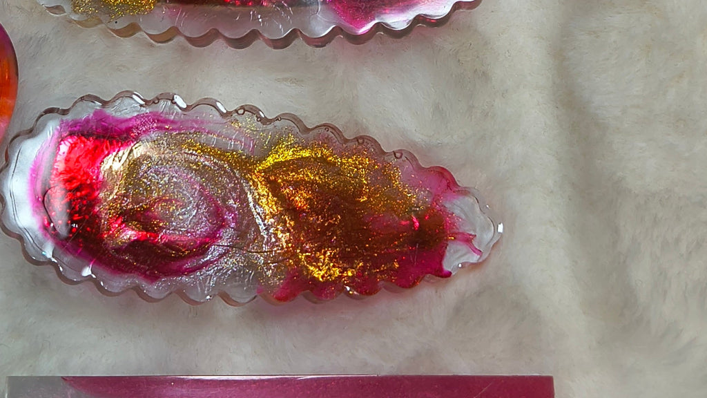 Hair Clips, three hair clips in beautiful pinks and gold.  Two match in style and color, with a heart shaped Keychain in a sparkles, all are resin
