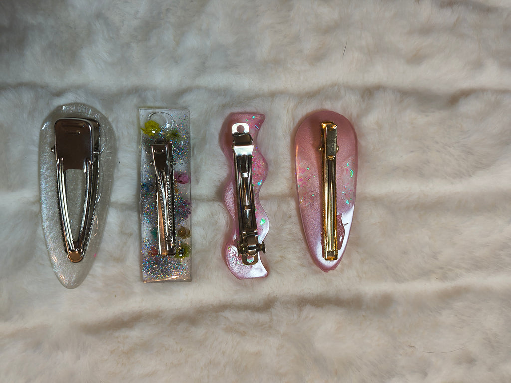 Hair Clips. Set of four, Variety pack, pinks and whites, one with flowers, all resin