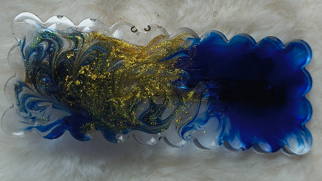 Hair Clips. Three in pack, two are matching in style with silver beads, one clip is in blue and gold swirls