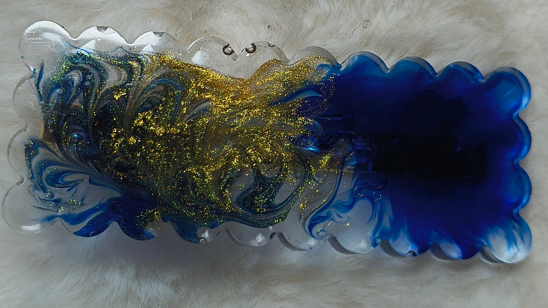 Hair Clips. Three in pack, two are matching in style with silver beads, one clip is in blue and gold swirls