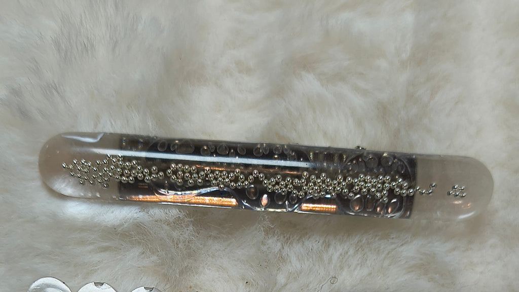 Hair Clips. Three in pack, two are matching in style with silver beads, one clip is in blue and gold swirls