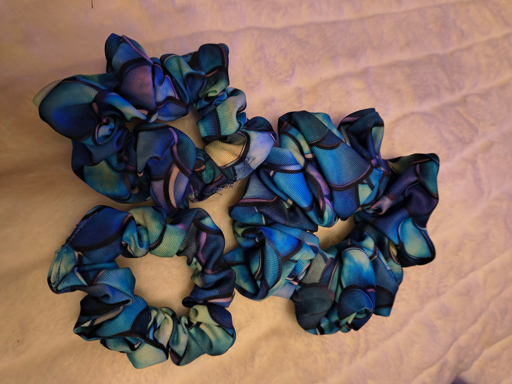 Scrunchie, hair accessory, 3 pack including a small, medium and Large scrunchie in deep blues and a variegated colors