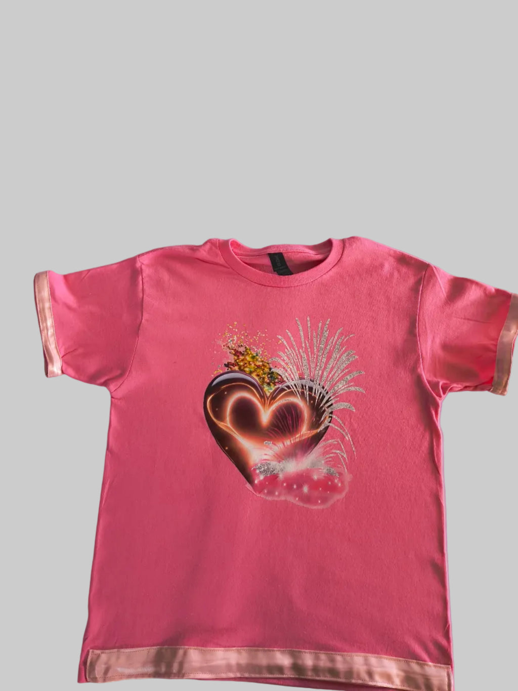 Pink T-Shirt with a heart design Front view