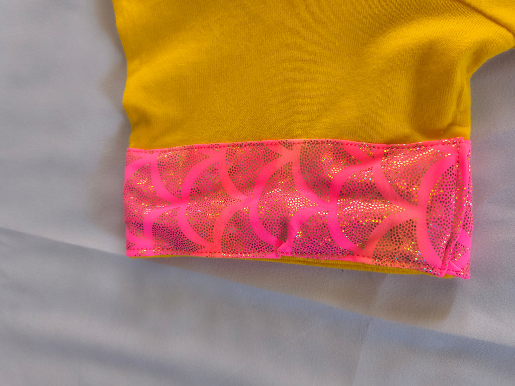 Short sleeve T-shirt,  Yellow , Trimmed in a multi color edging  that  has "Thank You" on the graphics