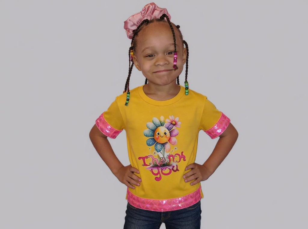 Short sleeve T-shirt,  Yellow , Trimmed in a multi color edging  that  has "Thank You" on the graphics